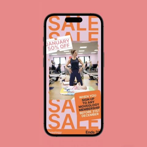 Image showing social media graphics on a mobile phone. The background is pink and the graphics show a January sale offer for Moveology Studio.
